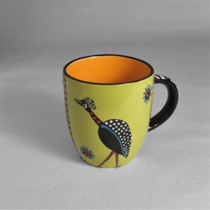Vacker kopp med fågel